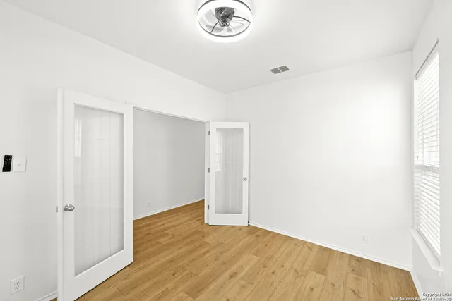 a view of entryway with wooden floor