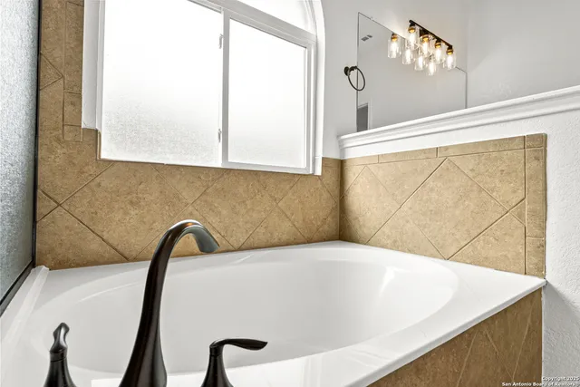 a bathroom with a bathtub