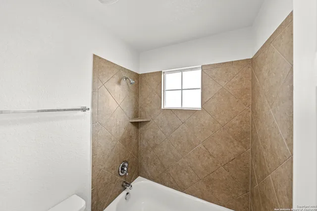 a view of a big room with carpet