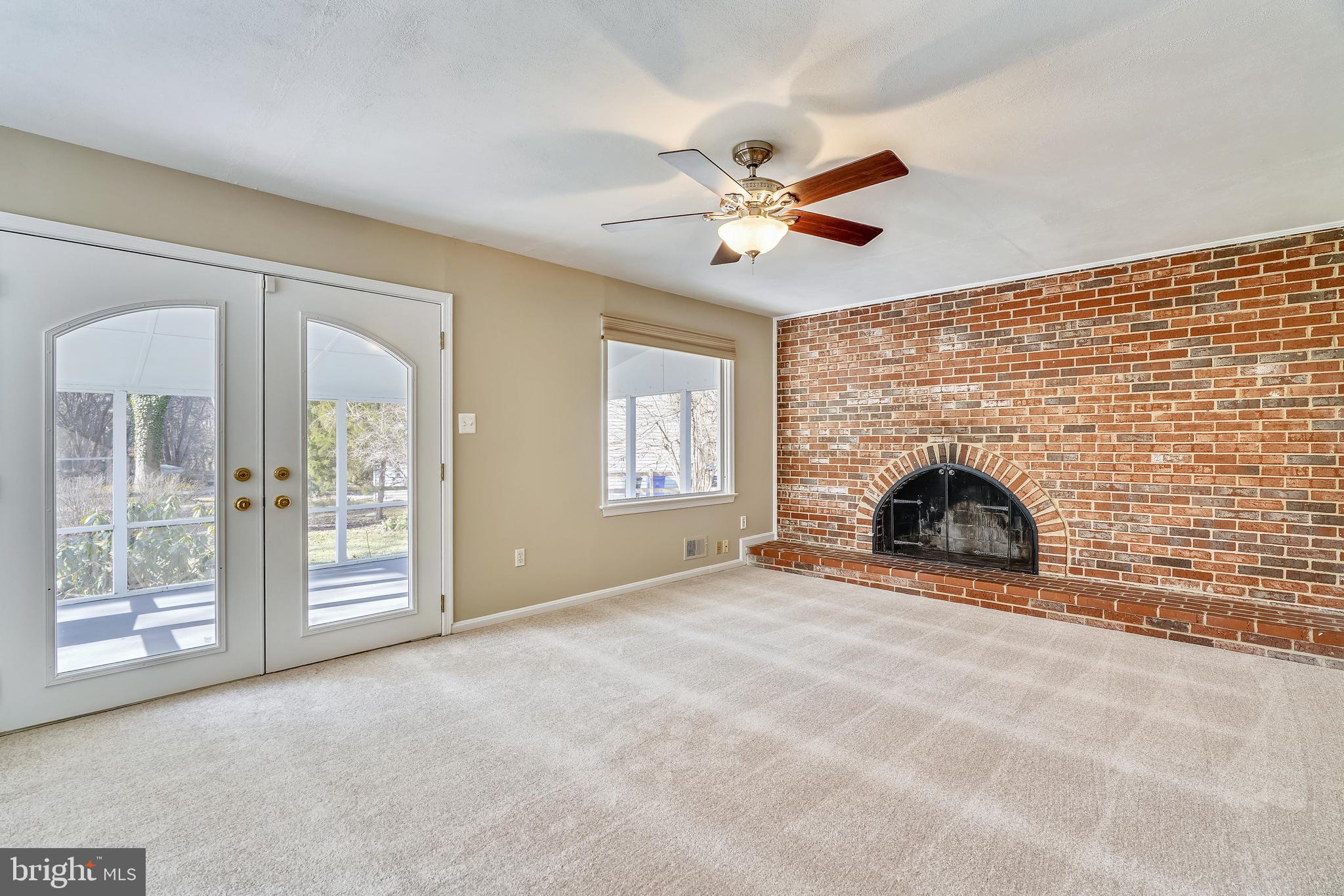 9354 Mellenbrook Road Columbia, MD 21045 - Photo 15 of 36 Wall to wall brick masonry fireplace