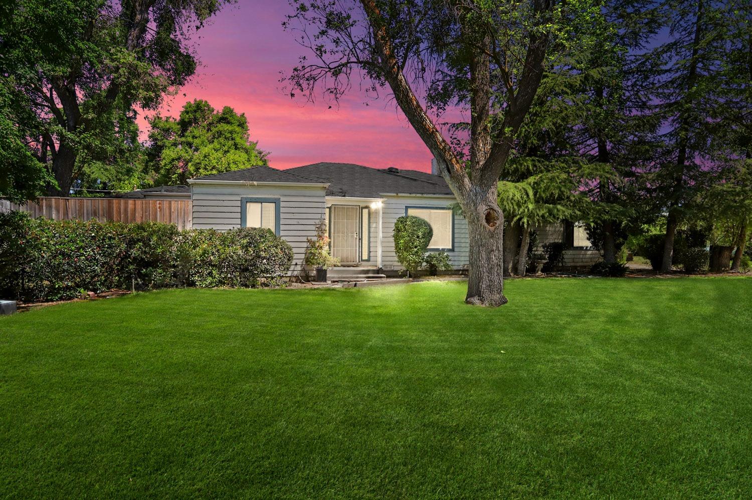 6791 Live Oak Road Lodi, CA 95240 - Photo 1 of 1 a front view of house with yard and green space