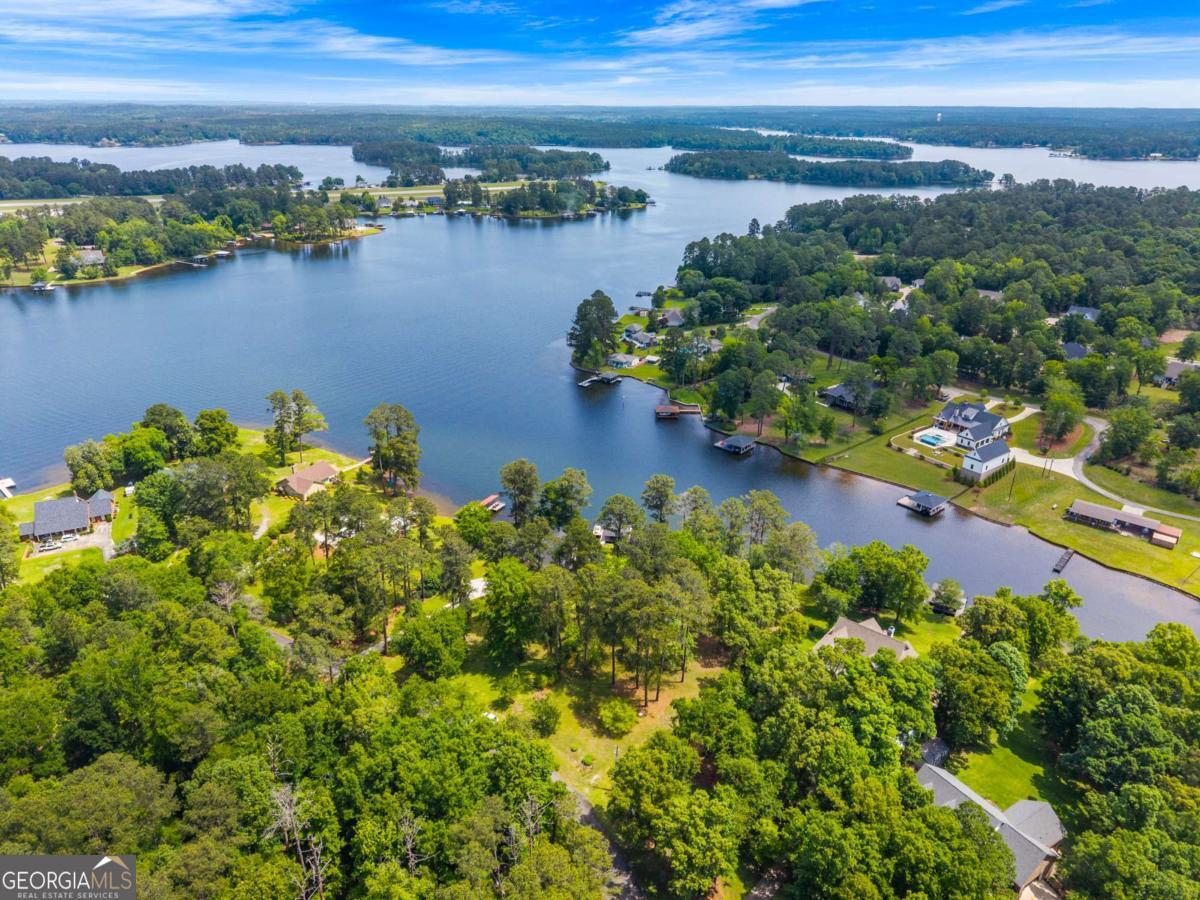 151 Bill Johnson Road Northeast Milledgeville, GA 31061 - Photo 11 of 27 an aerial view of a houses with ocean view