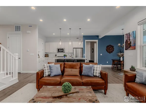a living room with furniture and a couch