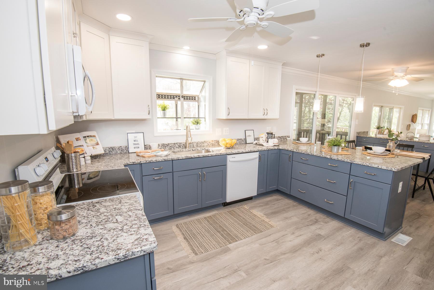 5627 Gunner Run Road Churchton, MD 20733 - Photo 18 of 81 New cabinets, granite, appliances, sink, lighting