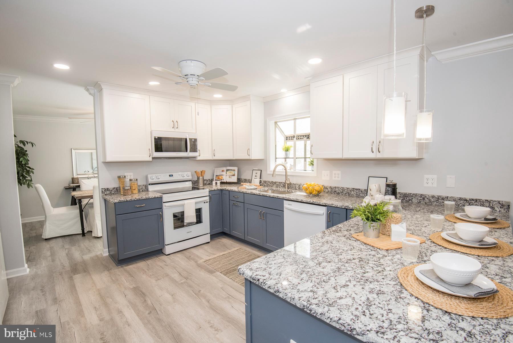 5627 Gunner Run Road Churchton, MD 20733 - Photo 19 of 81 New pendant lighting over new granite counters