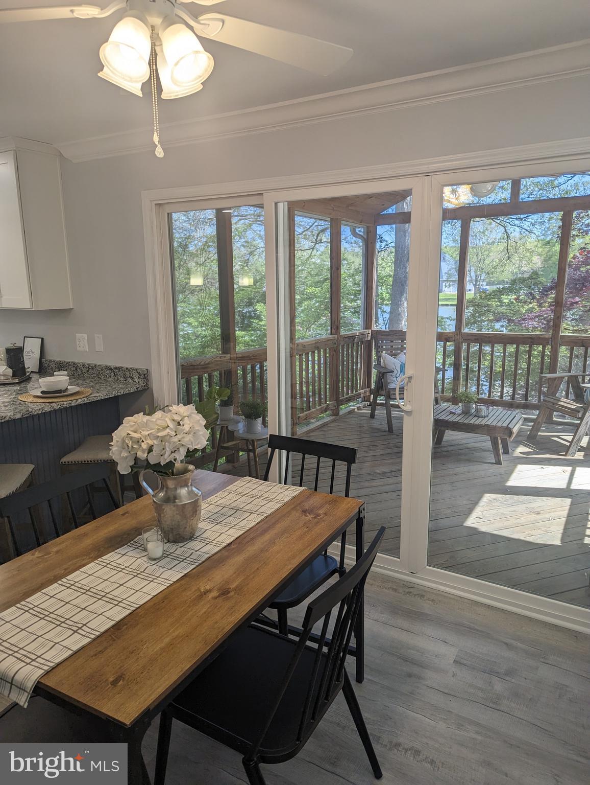 5627 Gunner Run Road Churchton, MD 20733 - Photo 25 of 81 Slider to screened porch off eat-in kitchen area