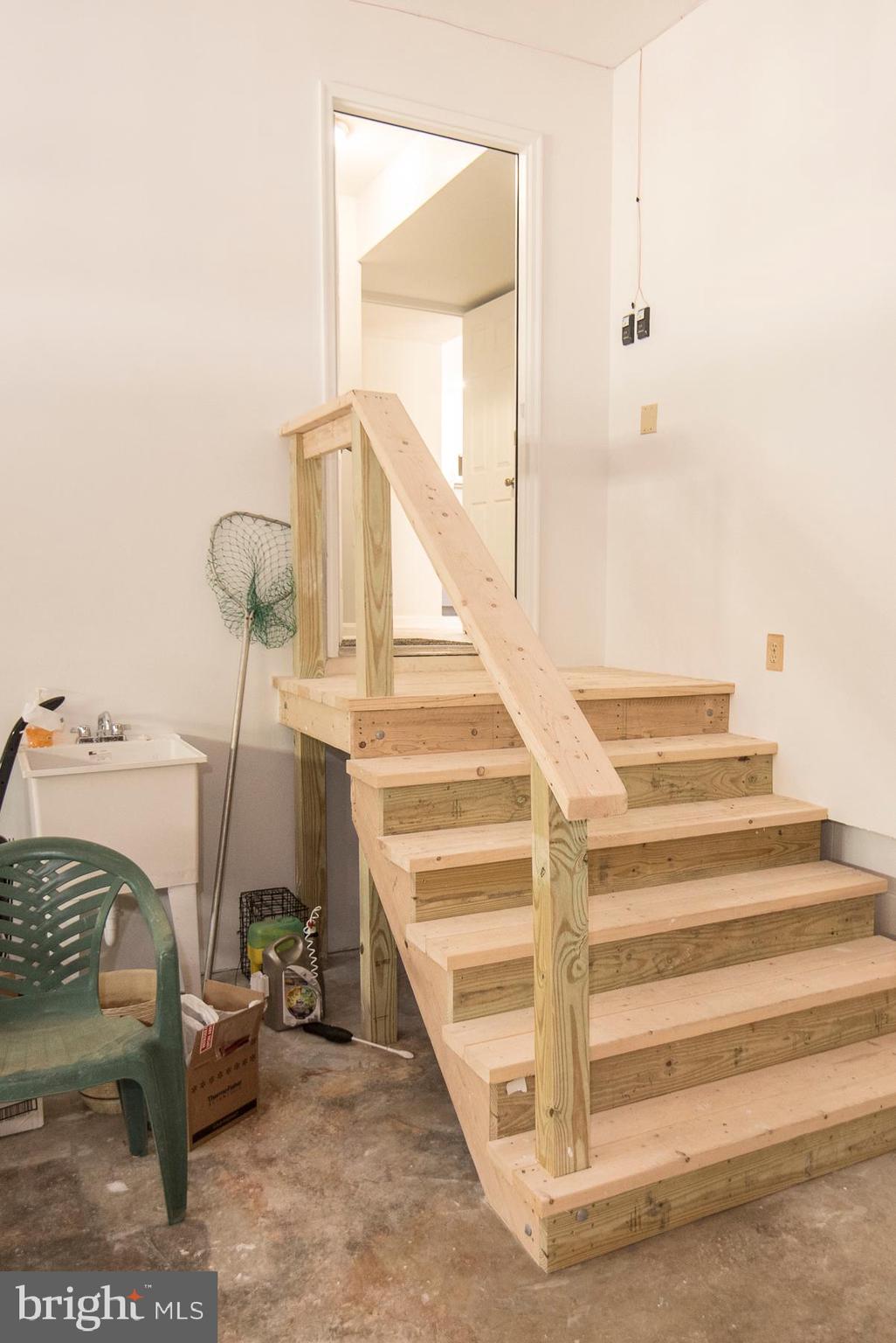 5627 Gunner Run Road Churchton, MD 20733 - Photo 35 of 81 New garage steps from mud room, new utility sink