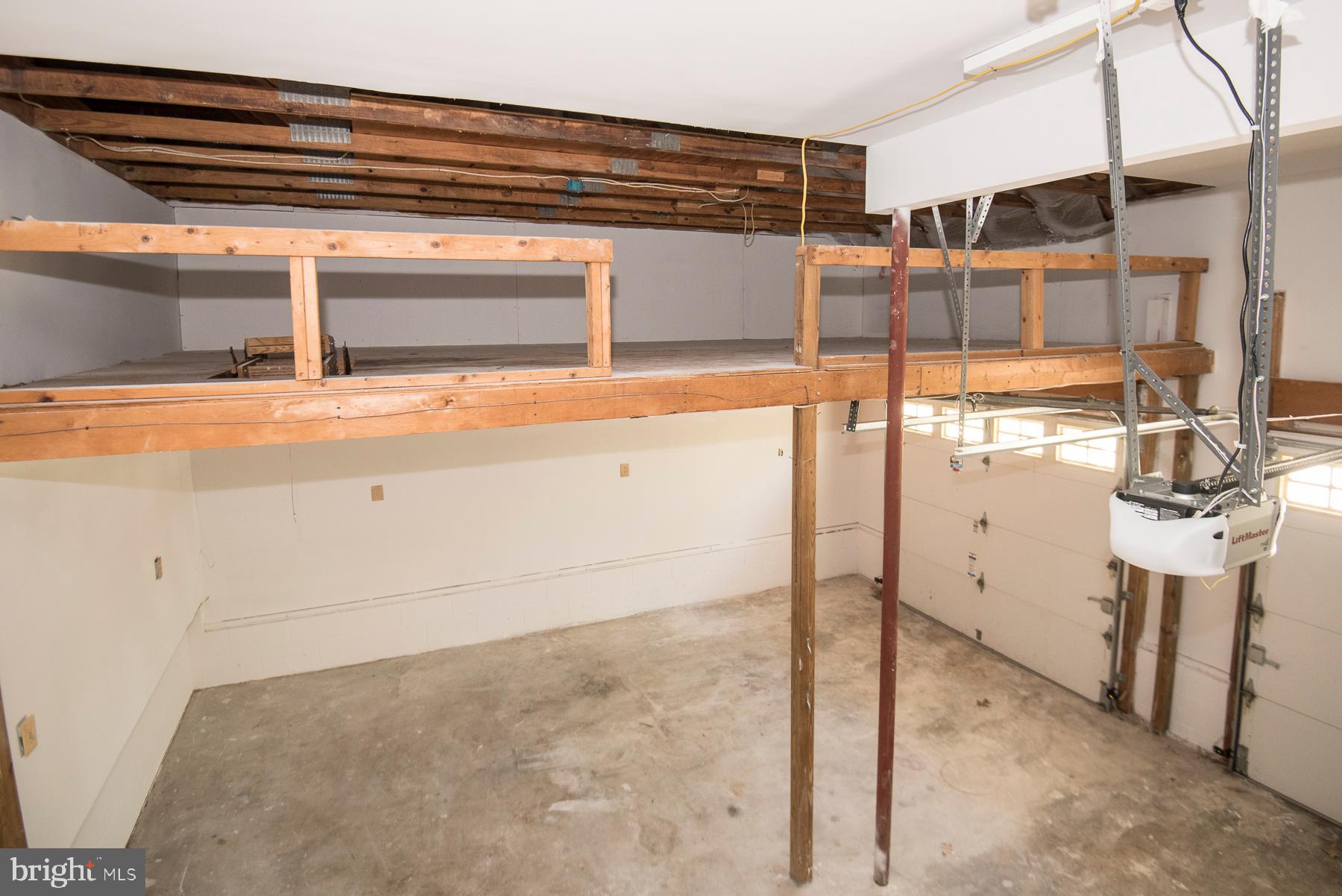 5627 Gunner Run Road Churchton, MD 20733 - Photo 36 of 81 Pull down steps to custom loft--tons of storage!