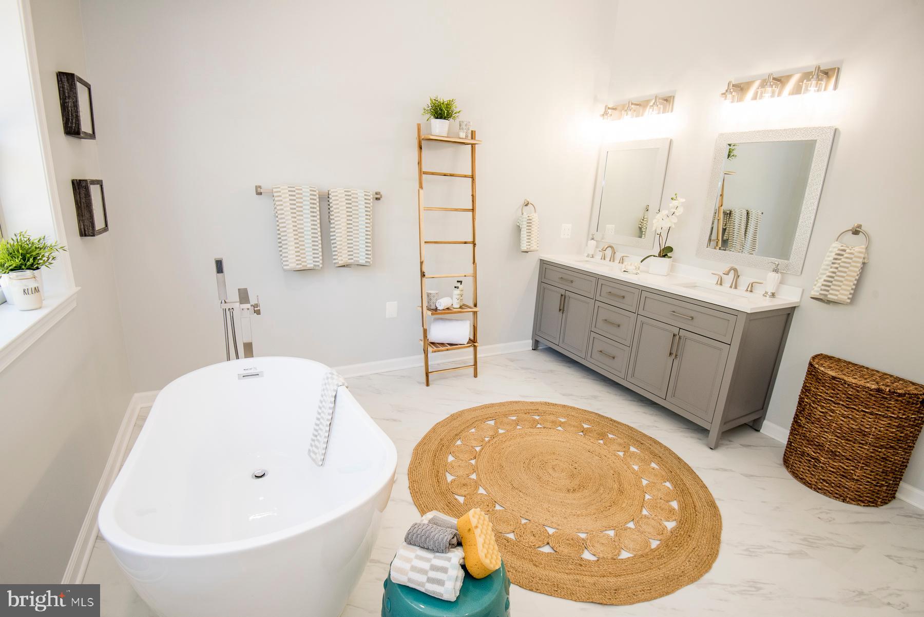 5627 Gunner Run Road Churchton, MD 20733 - Photo 42 of 81 Primary-new vanity,tub,shower,tile,floor,toilet