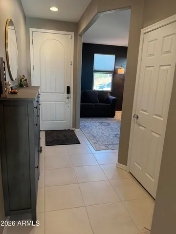 a living room with furniture and window