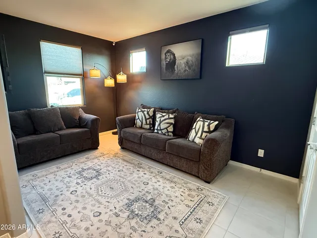 a living room with furniture and window