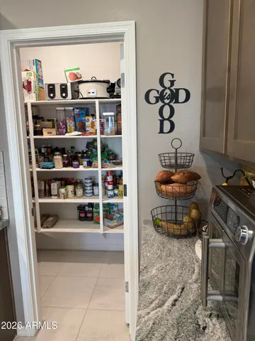 a room with books and knick knacks on it