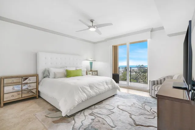 a view of a balcony and a floor to ceiling window