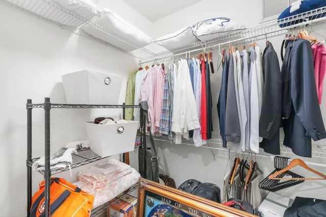 a bathroom with a granite countertop sink a mirror and a