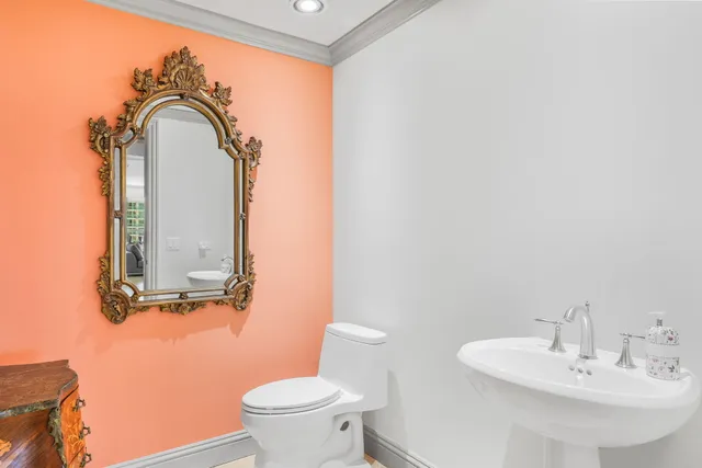 a bedroom with bed and window