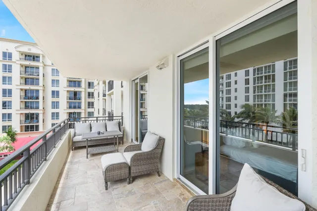 a bathroom with a tub shower and sink