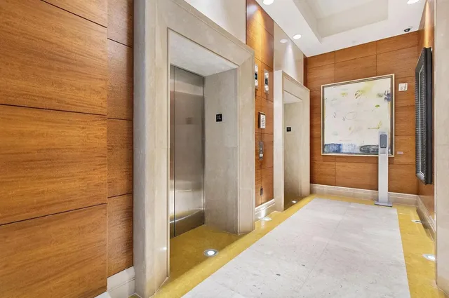 a patio with a table and chairs