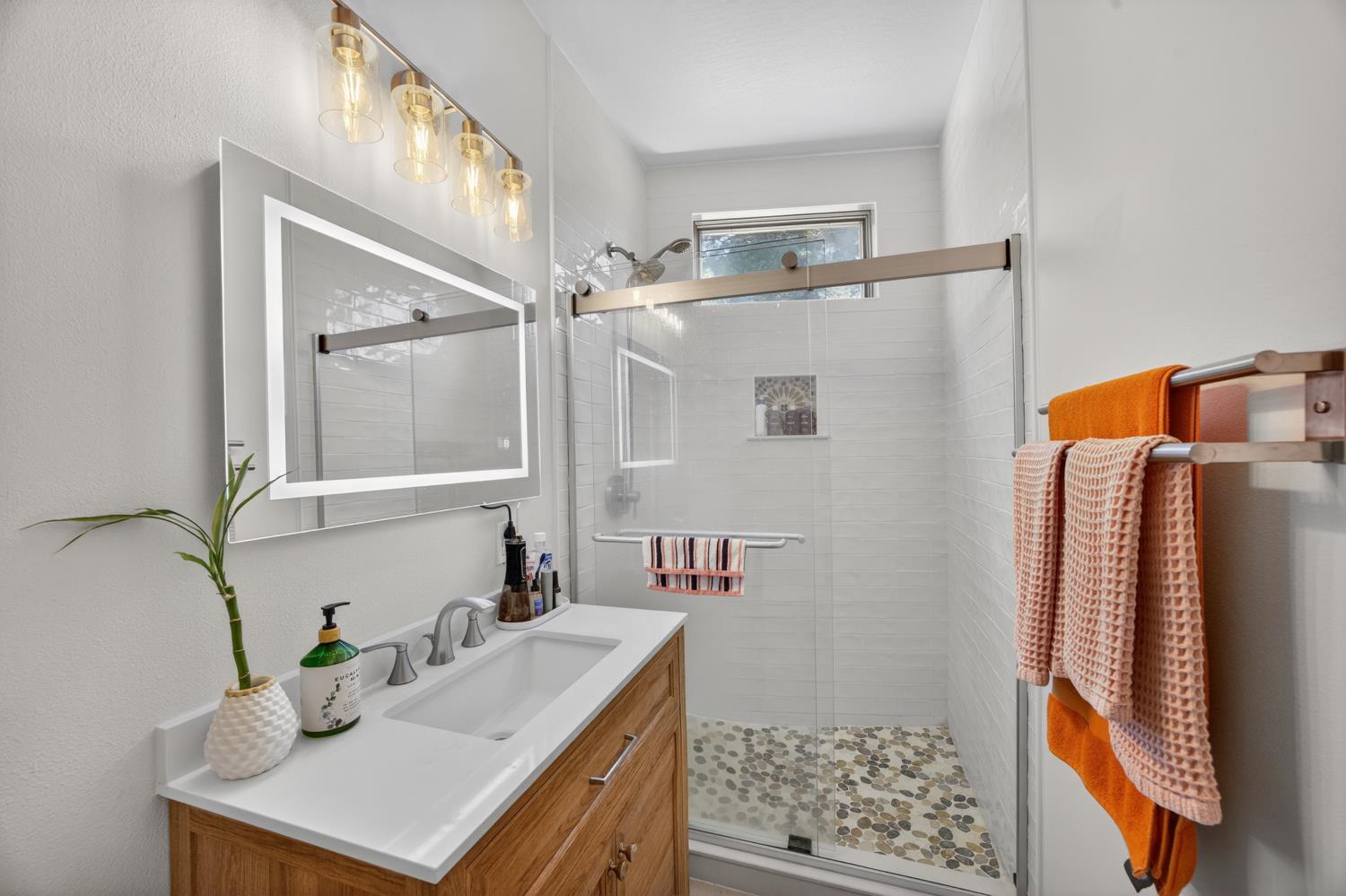 3940 Bannister Road Fair Oaks, CA 95628 - Photo 23 of 84 a bathroom with a sink vanity granite tub and shower