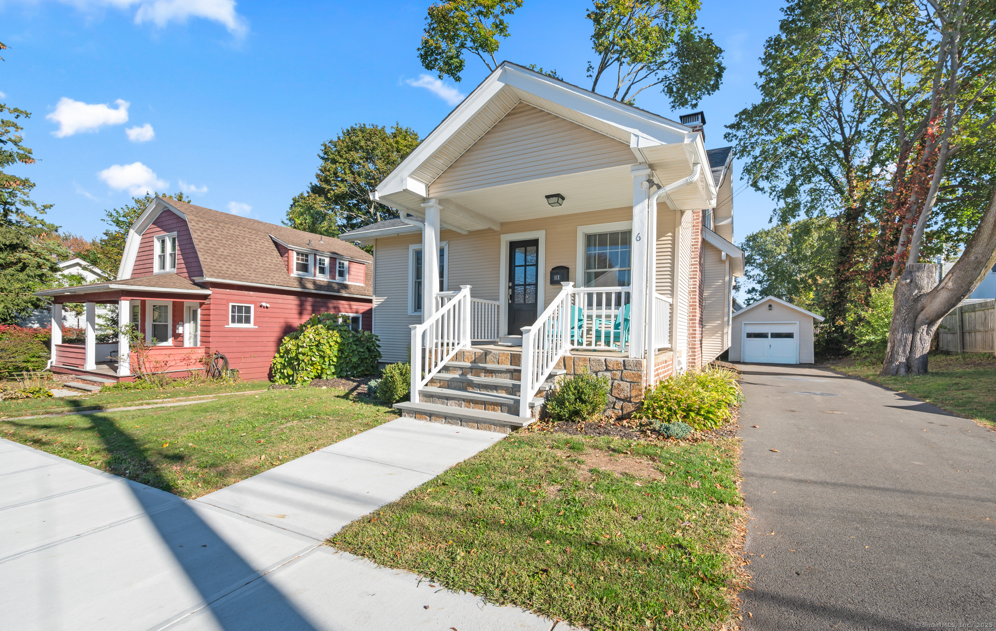 front view of a house with a yard