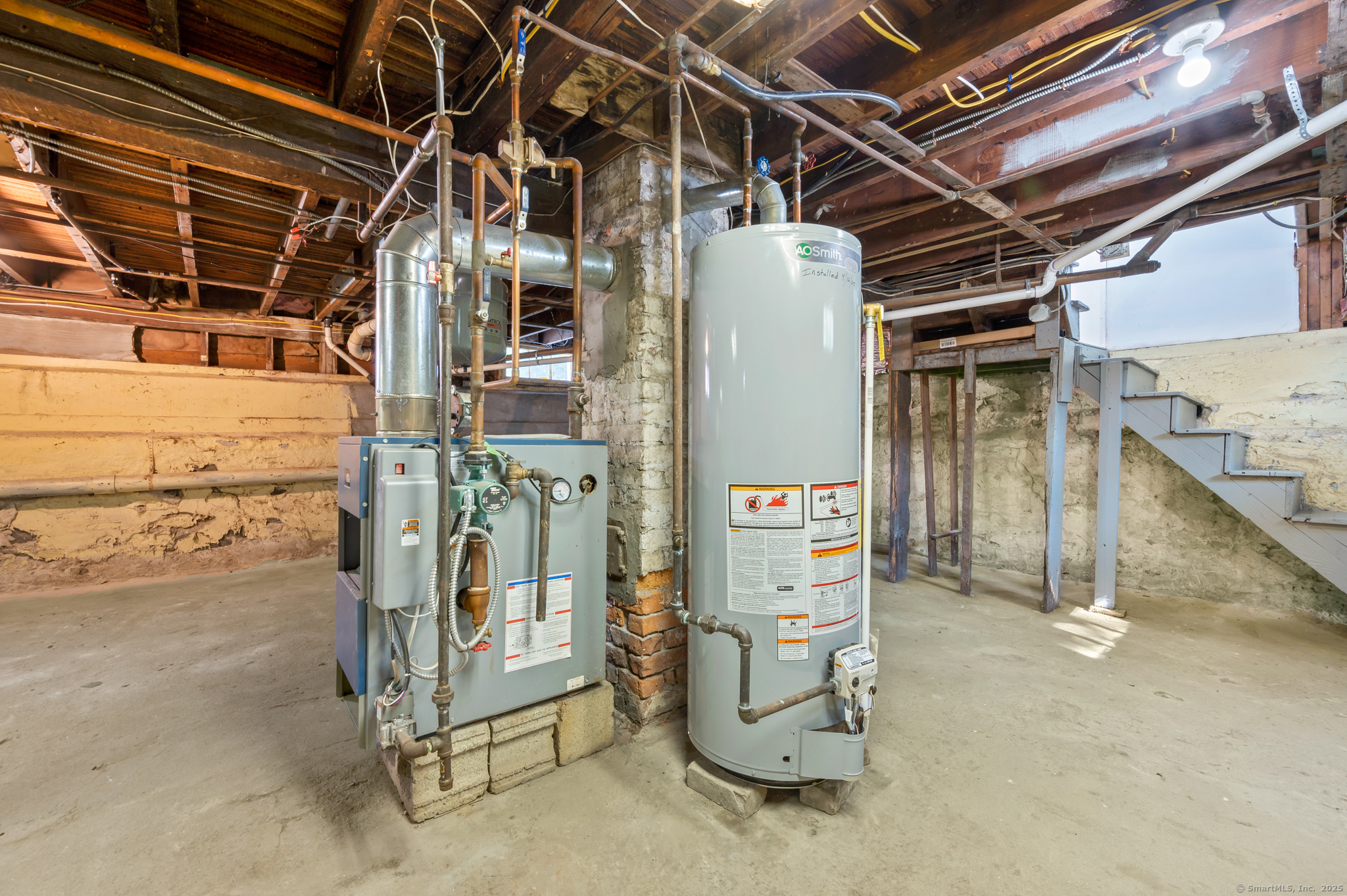 6 Howe Street Milford, CT 06460 - Photo 31 of 32 a utility room with dryer and washer
