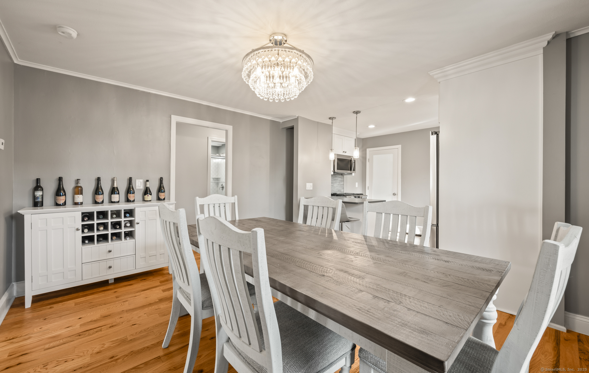 6 Howe Street Milford, CT 06460 - Photo 8 of 32 a view of a dining room with furniture and wooden floor
