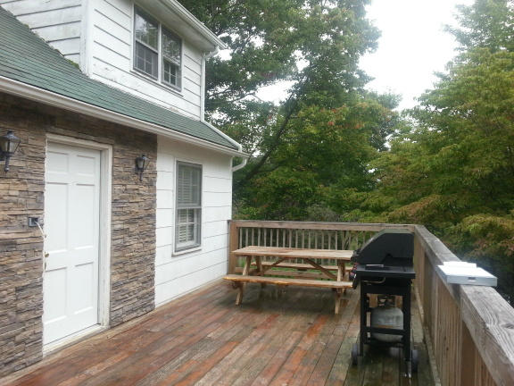 2753 Camp Carysbrook Road Riner, VA 24149 - Photo 14 of 19 a view of a bench in the balcony