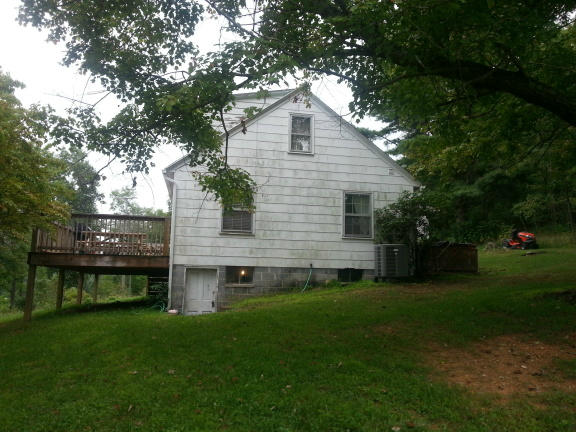 2753 Camp Carysbrook Road Riner, VA 24149 - Photo 19 of 19 a front view of house with yard and green space