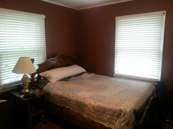 2753 Camp Carysbrook Road Riner, VA 24149 - Photo 3 of 19 a bedroom with a bed and a window