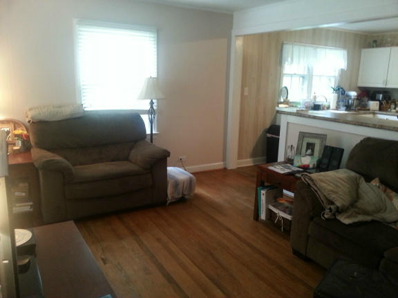 2753 Camp Carysbrook Road Riner, VA 24149 - Photo 6 of 19 a living room with furniture and a wooden floor