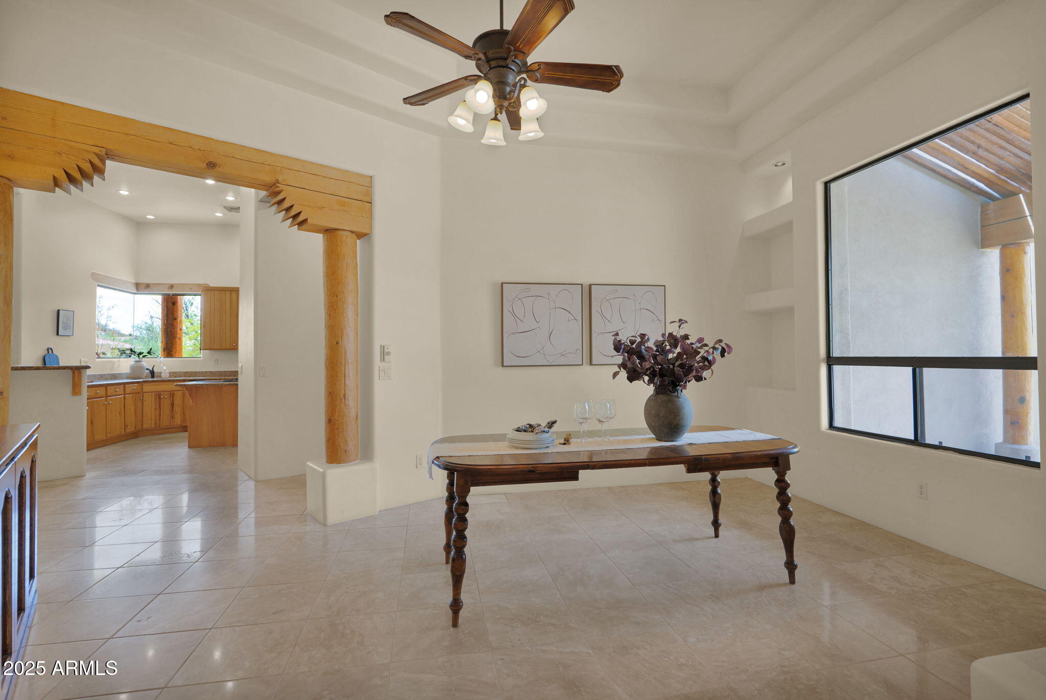 7130 East Saddleback Street, Unit 5 Mesa, AZ 85207 - Photo 11 of 57 a view of a livingroom with furniture and a potted plant
