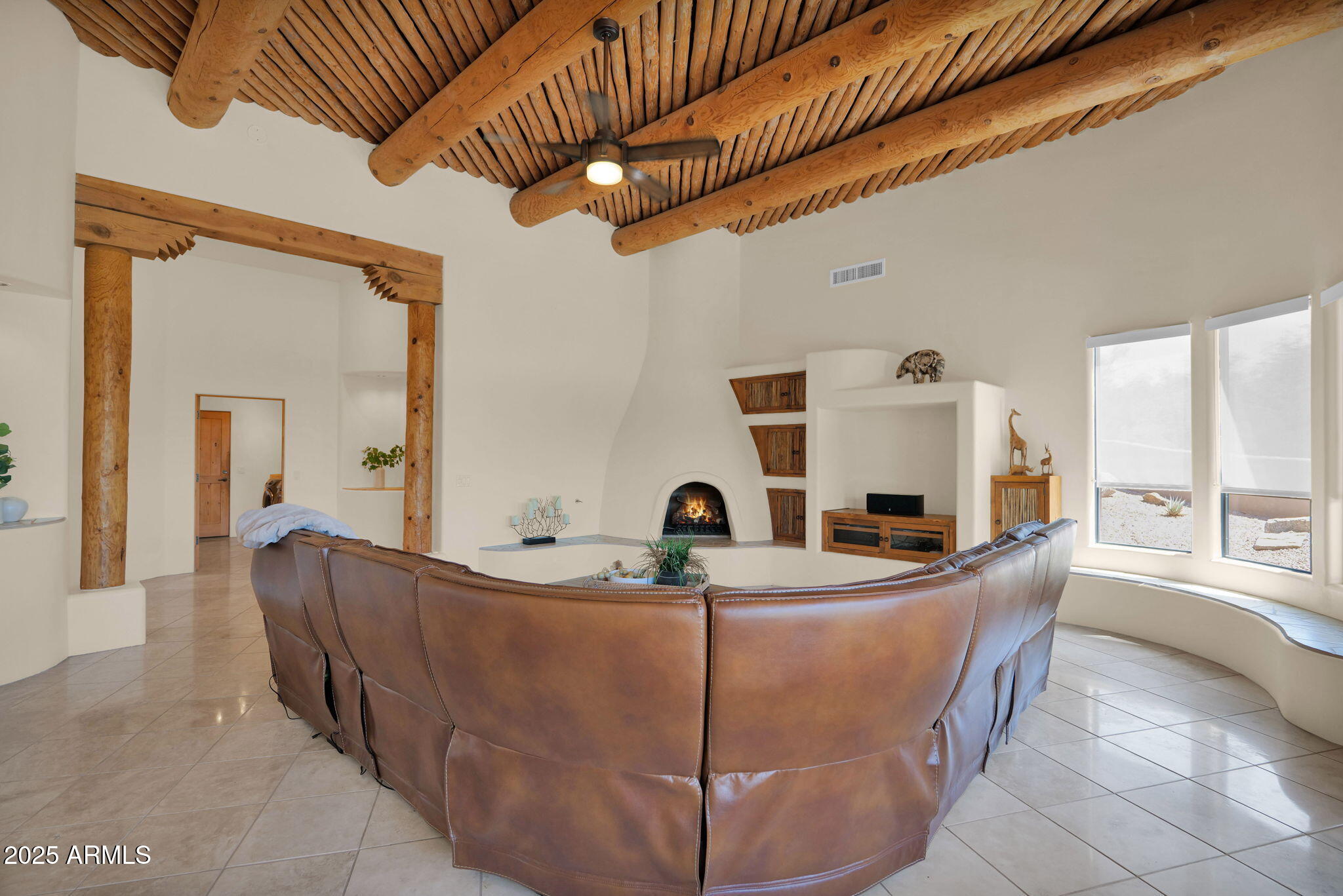 7130 East Saddleback Street, Unit 5 Mesa, AZ 85207 - Photo 14 of 57 a living room with furniture a flat screen tv