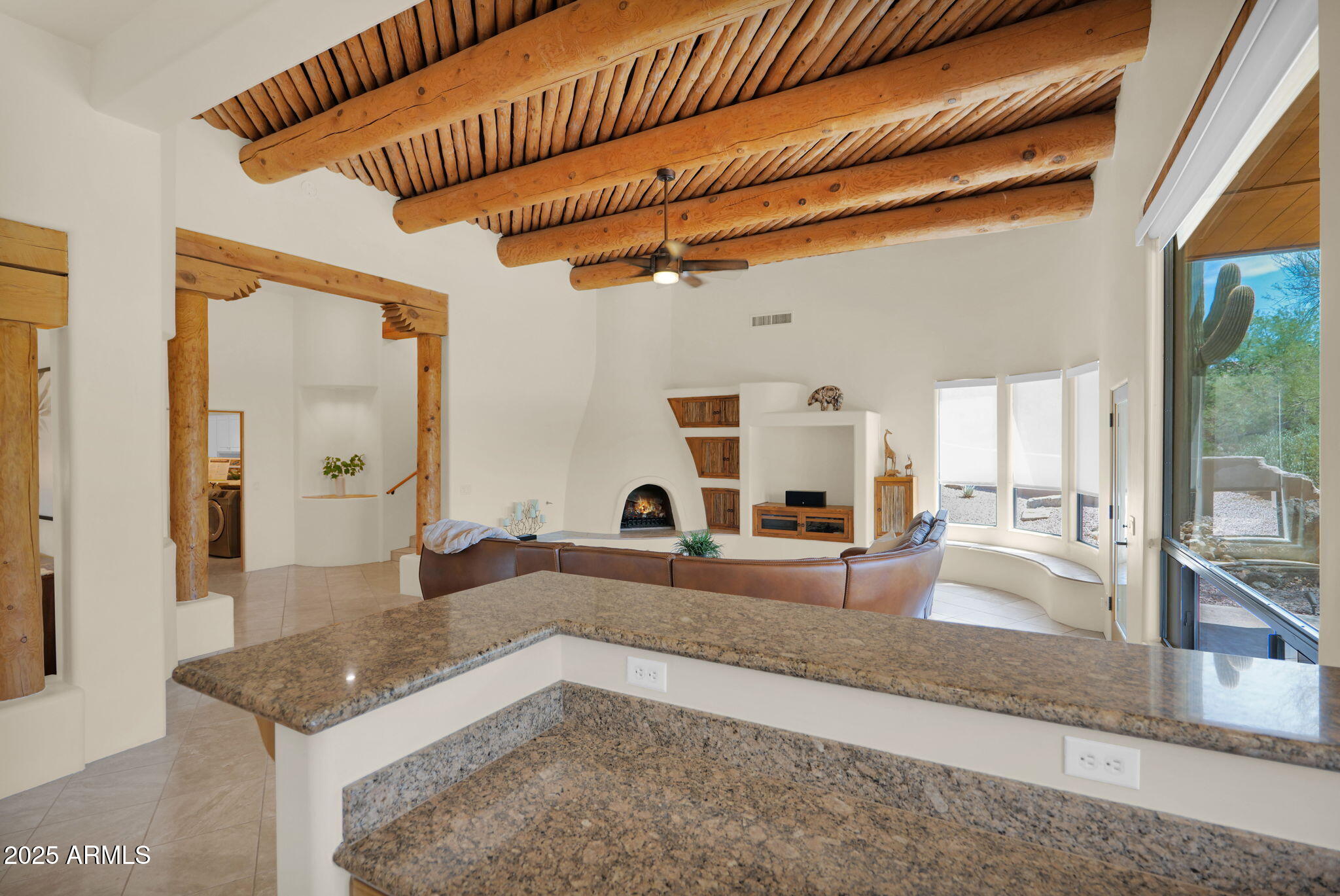 7130 East Saddleback Street, Unit 5 Mesa, AZ 85207 - Photo 16 of 57 a living room with furniture and a flat screen tv