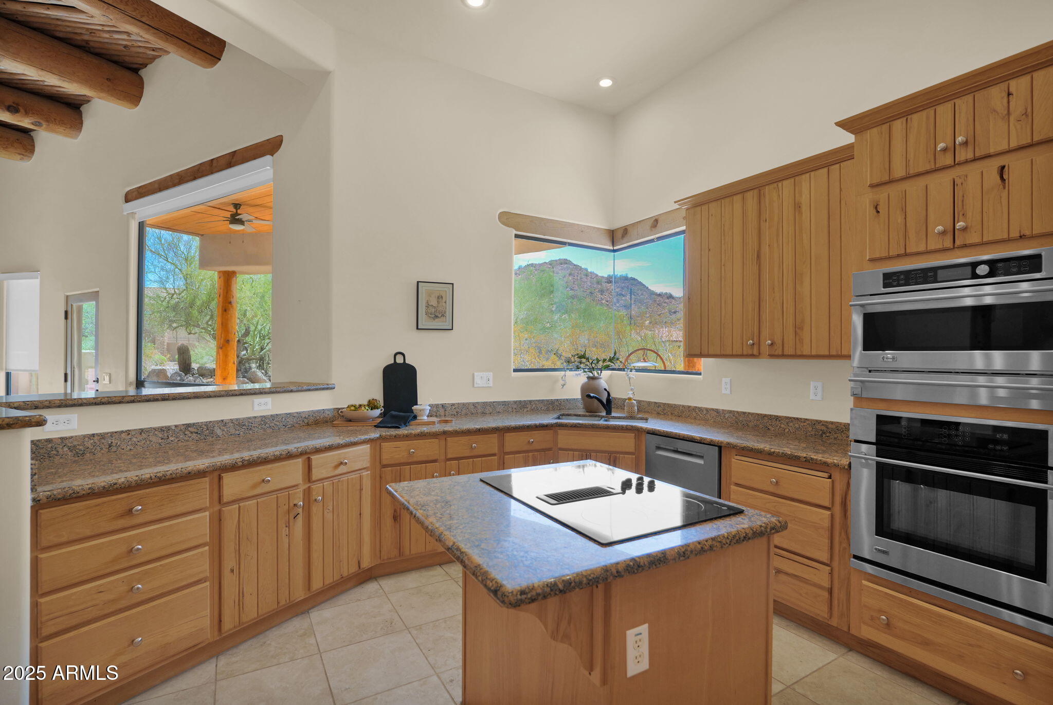 7130 East Saddleback Street, Unit 5 Mesa, AZ 85207 - Photo 18 of 57 a kitchen with a sink stove and cabinets