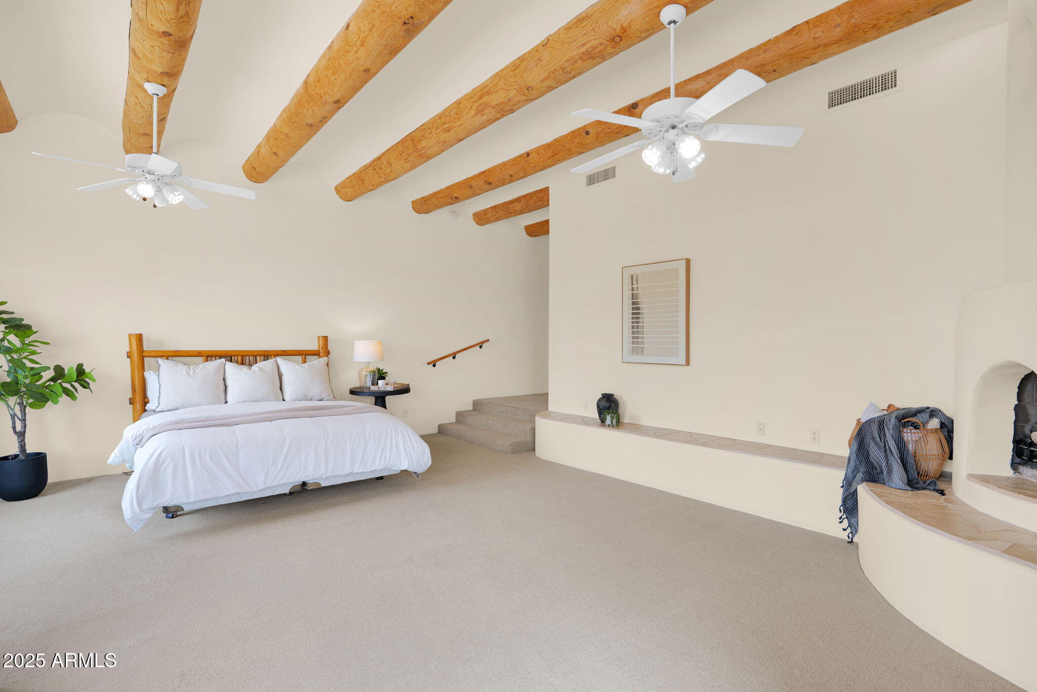 7130 East Saddleback Street, Unit 5 Mesa, AZ 85207 - Photo 23 of 57 a bedroom with bed and a chandelier