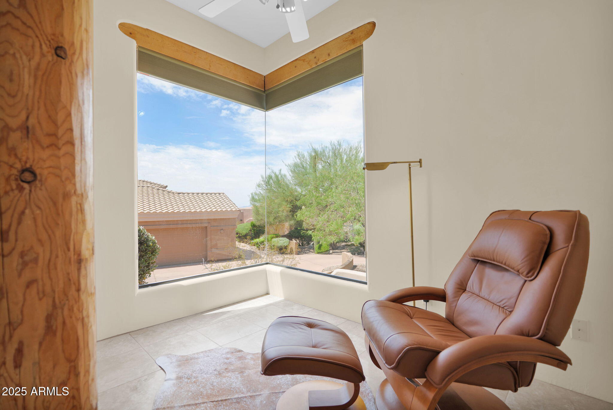7130 East Saddleback Street, Unit 5 Mesa, AZ 85207 - Photo 24 of 57 a living room with furniture and a large window
