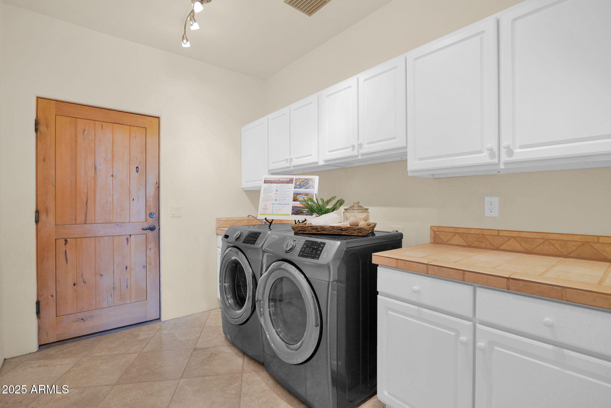7130 East Saddleback Street, Unit 5 Mesa, AZ 85207 - Photo 29 of 57 a utility room with dryer and washer