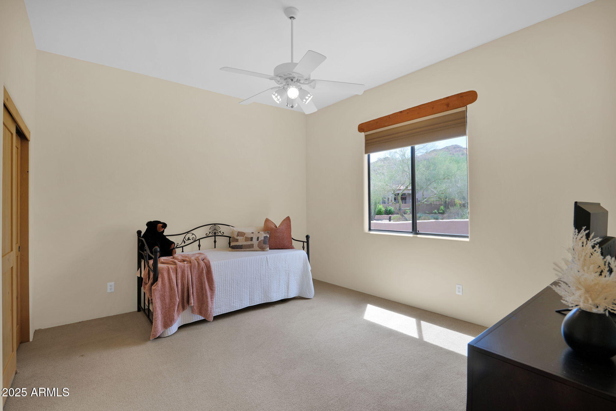 7130 East Saddleback Street, Unit 5 Mesa, AZ 85207 - Photo 33 of 57 a bed room with a bed and a window