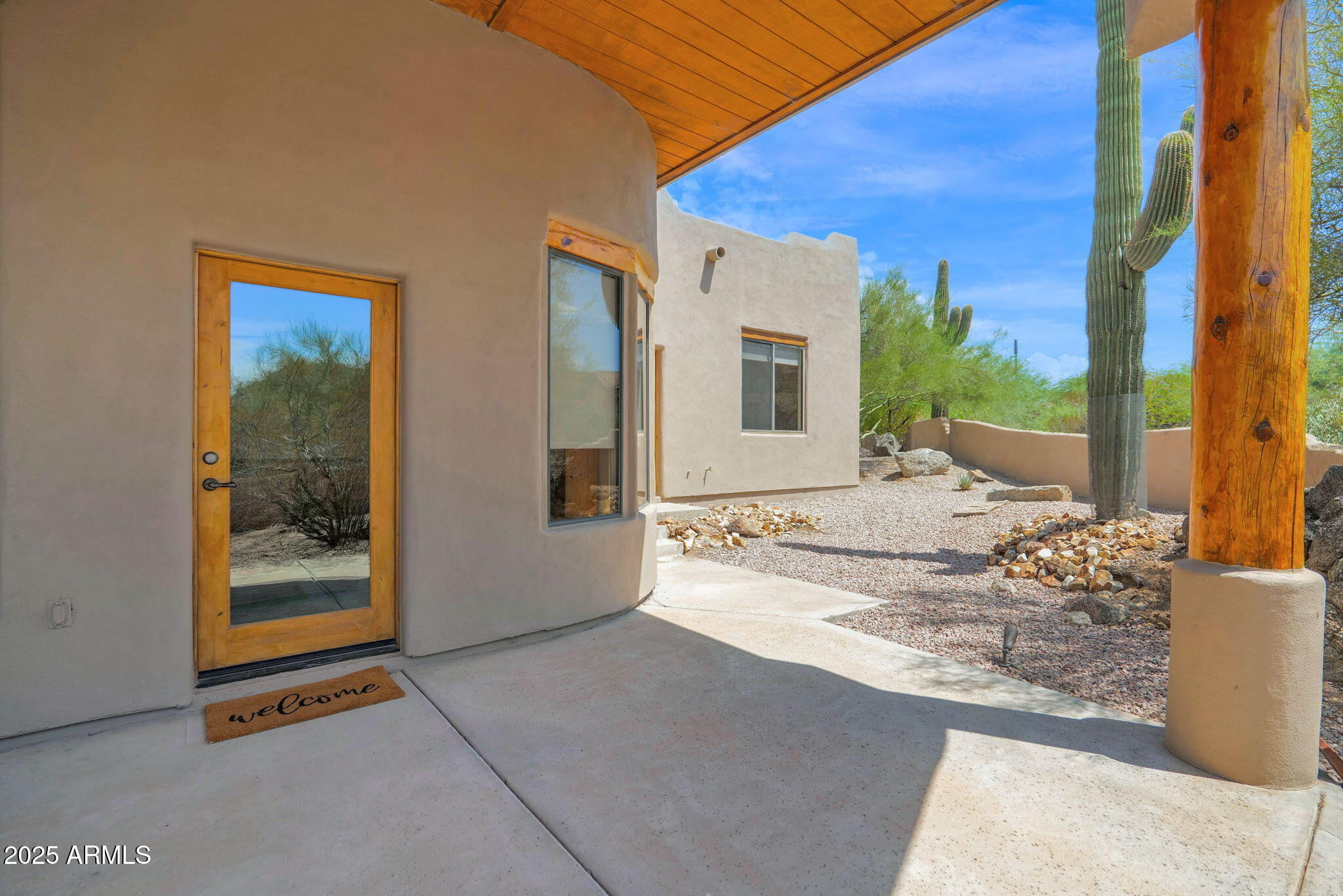 7130 East Saddleback Street, Unit 5 Mesa, AZ 85207 - Photo 36 of 57 a view of a house with a outdoor space