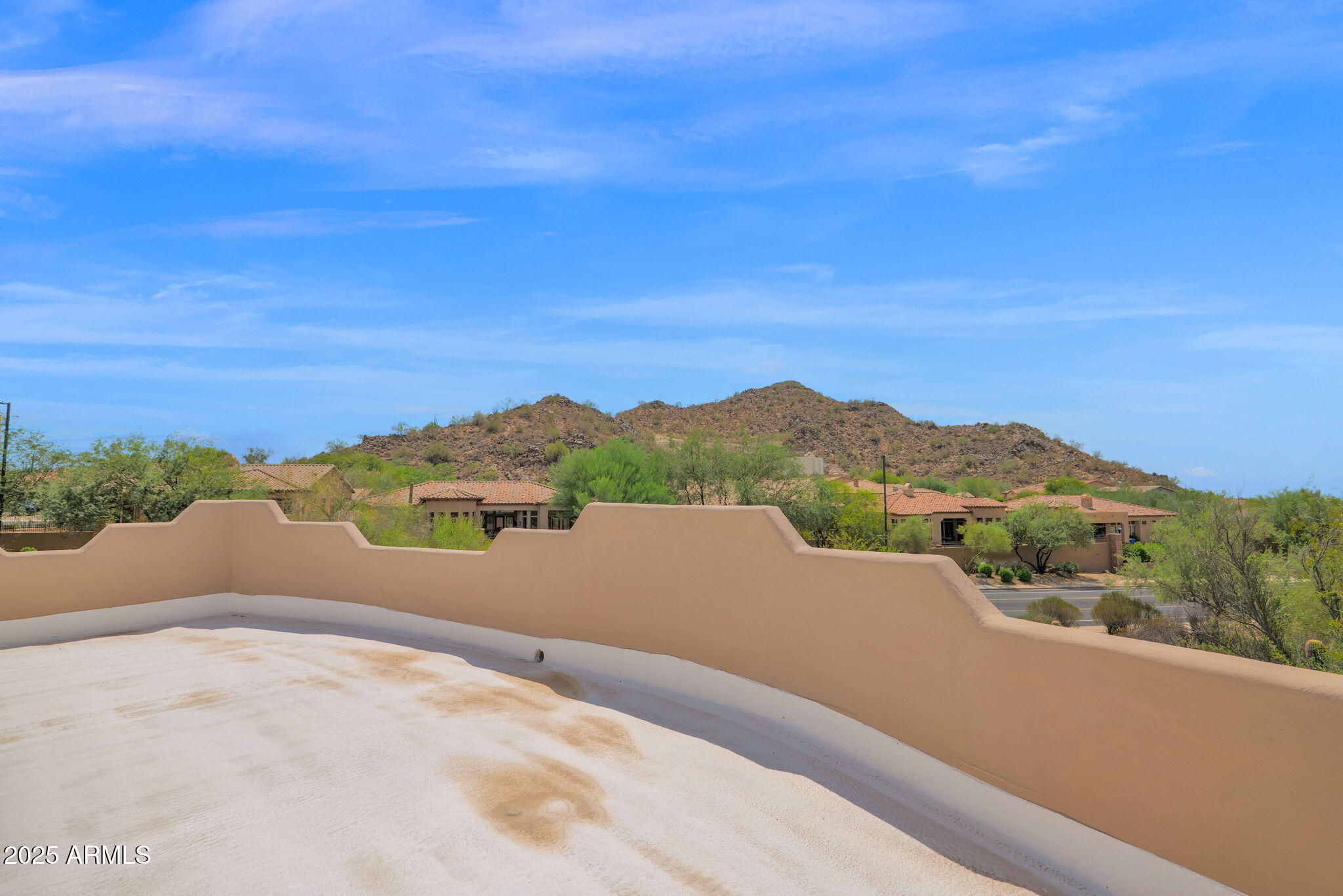 7130 East Saddleback Street, Unit 5 Mesa, AZ 85207 - Photo 39 of 57 a view of a lake with a mountain