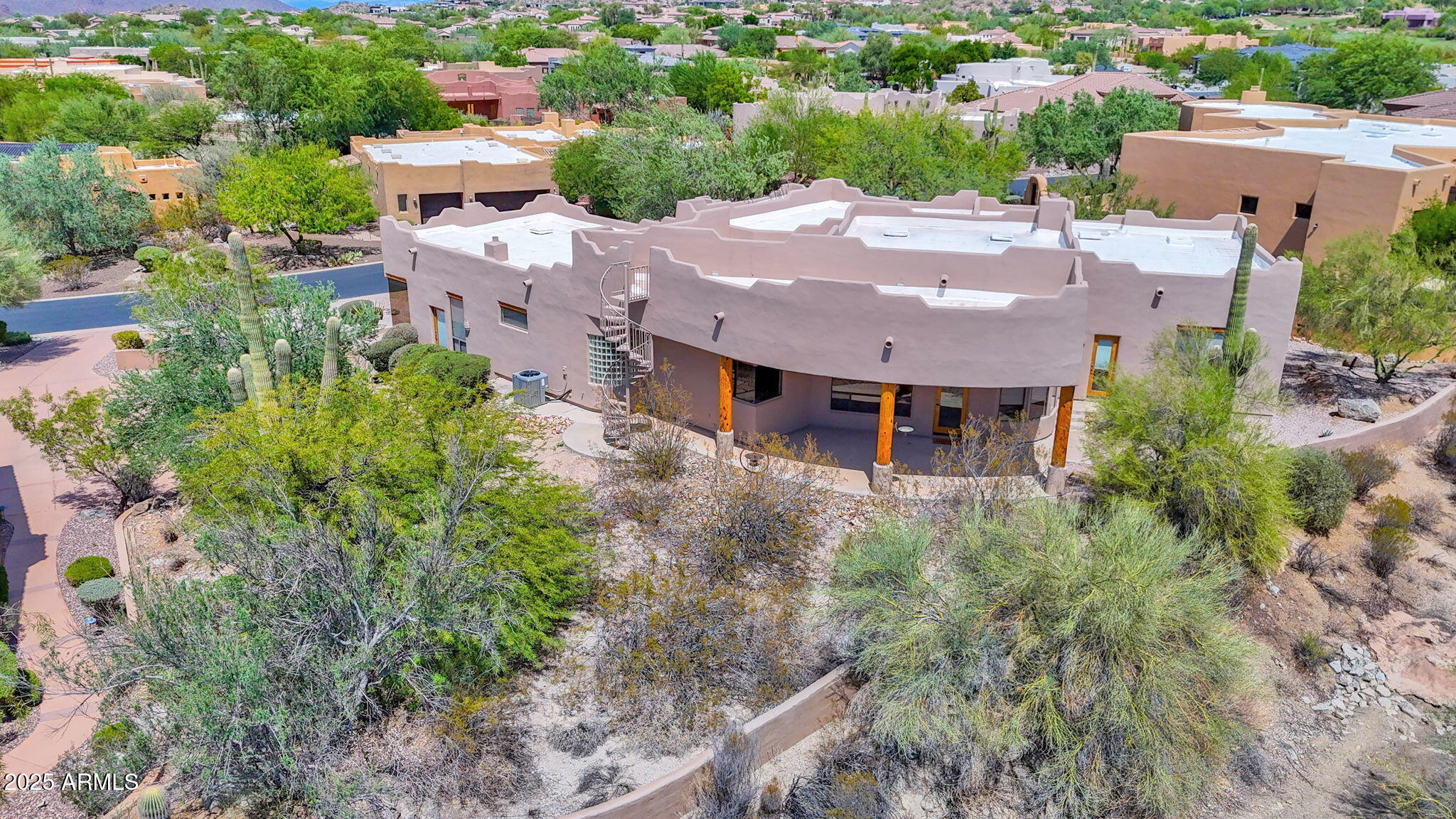 7130 East Saddleback Street, Unit 5 Mesa, AZ 85207 - Photo 54 of 57 an aerial view of a house with yard and outdoor space