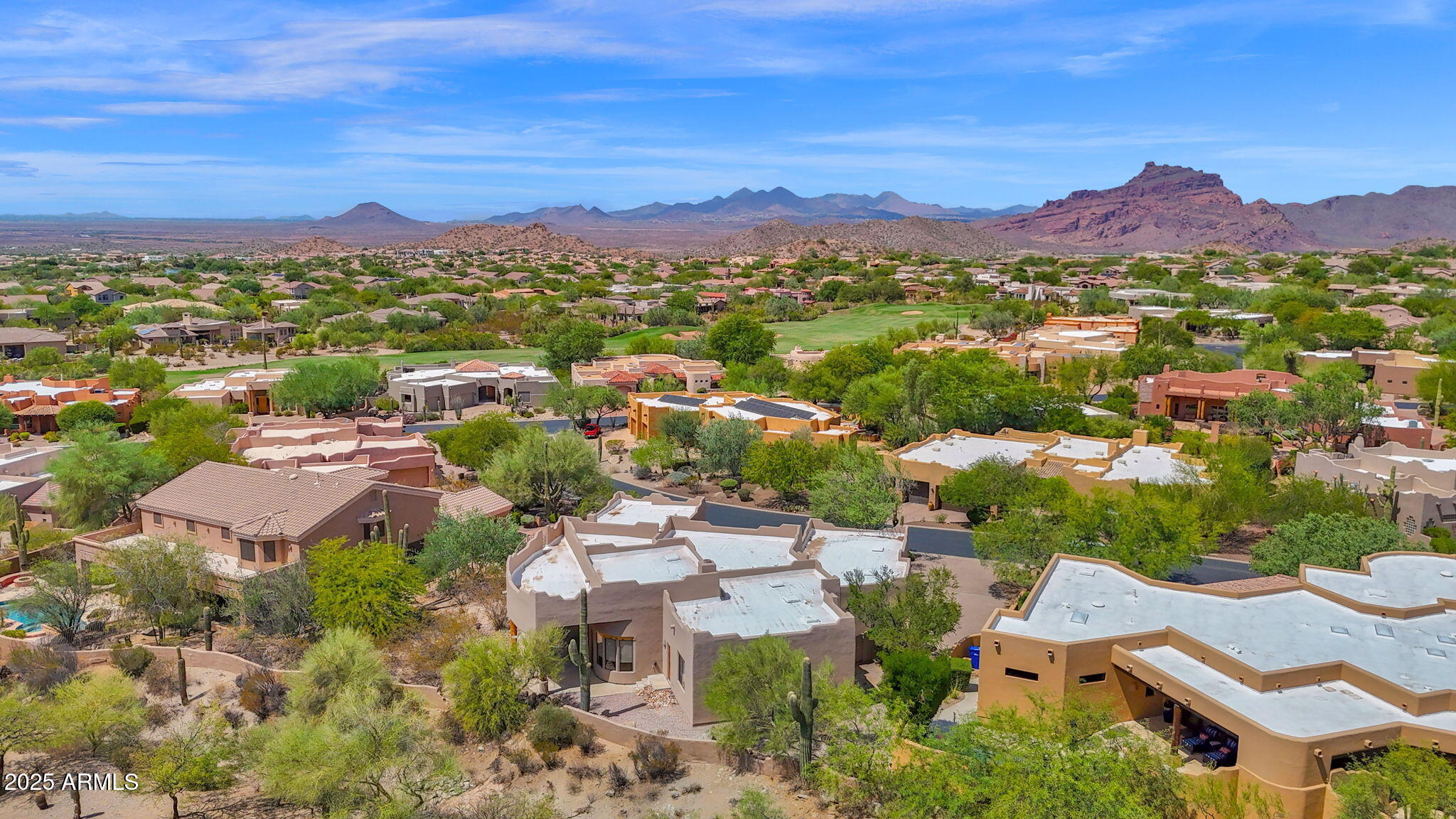 7130 East Saddleback Street, Unit 5 Mesa, AZ 85207 - Photo 6 of 57 an aerial view of residential houses with outdoor space and street view