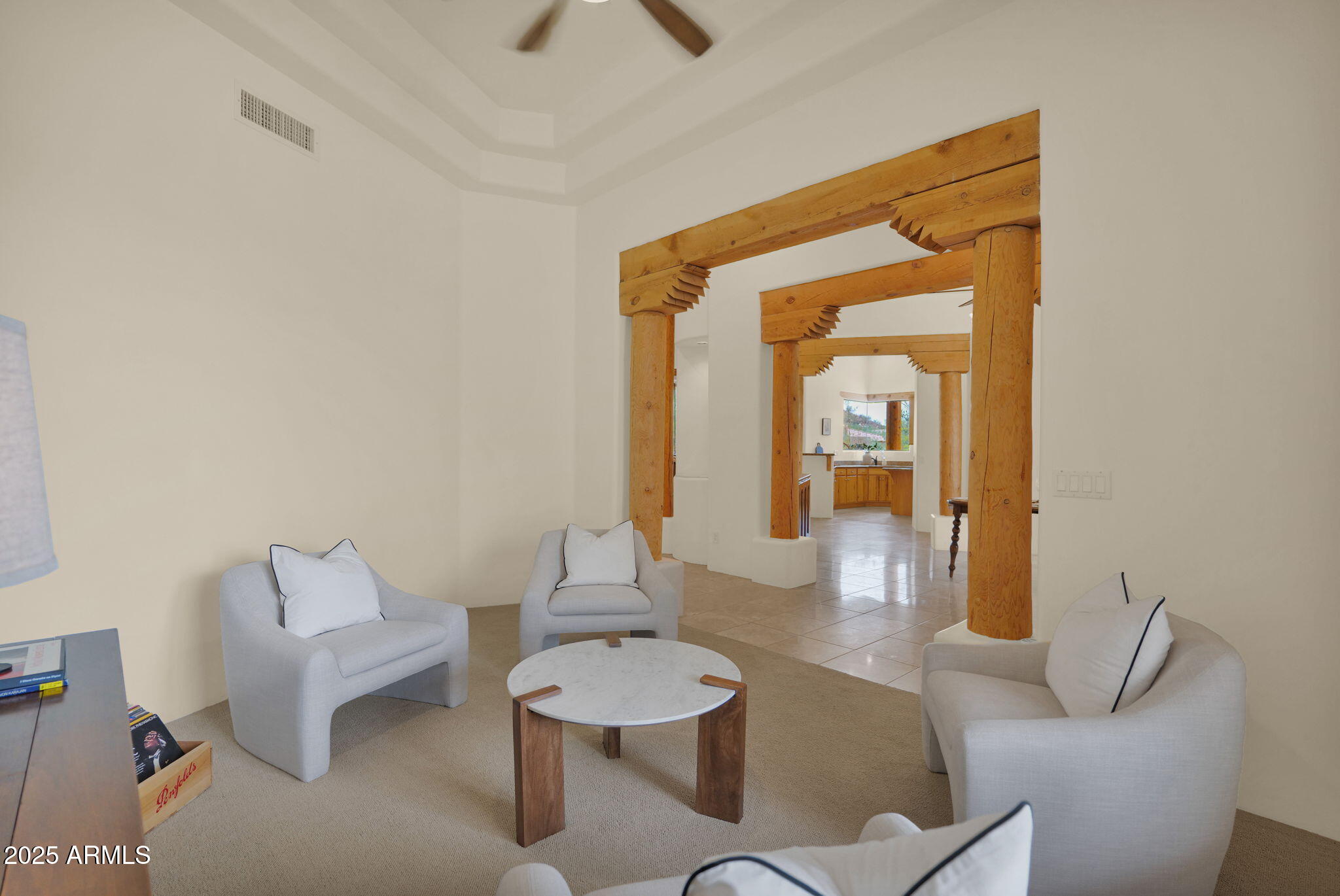 7130 East Saddleback Street, Unit 5 Mesa, AZ 85207 - Photo 9 of 57 a living room with furniture and a wooden floor