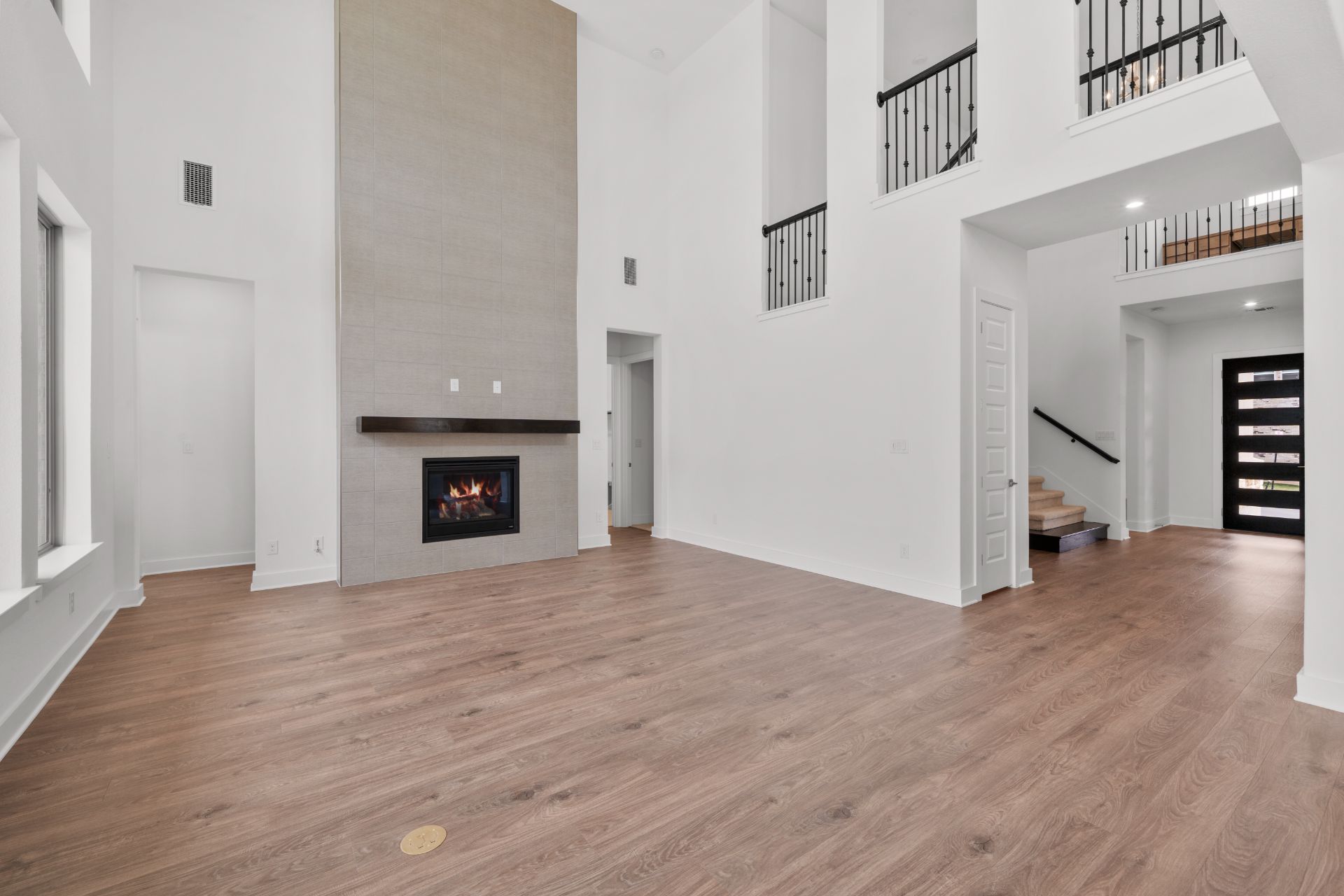1802 Crimson Sunset Drive Georgetown, TX 78628 - Photo 13 of 38 Family Room with soaring ceiling & fireplace