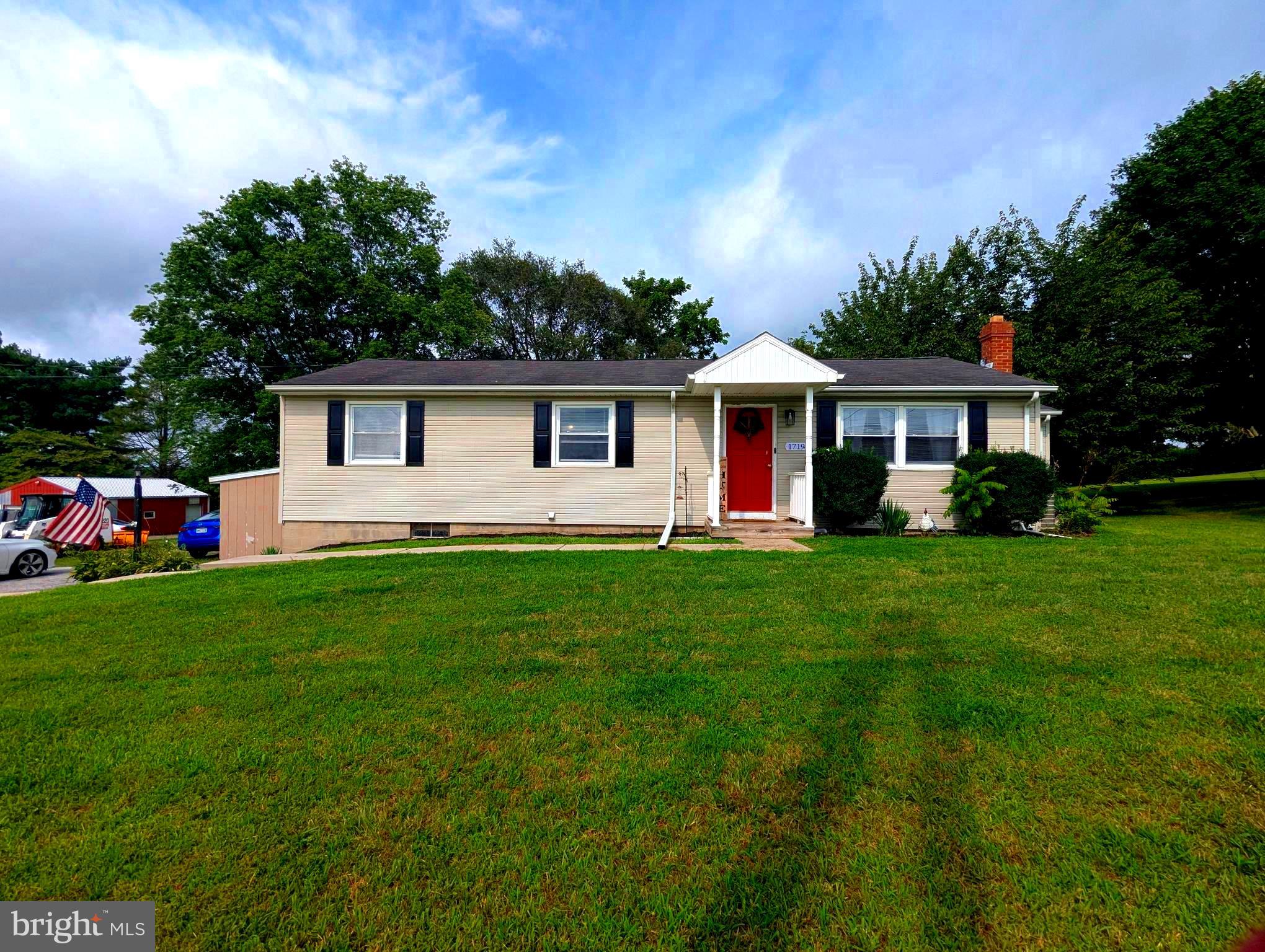 1719 Jefferson Road Spring Grove, PA 17362 - Photo 1 of 37 a front view of house with yard and green space
