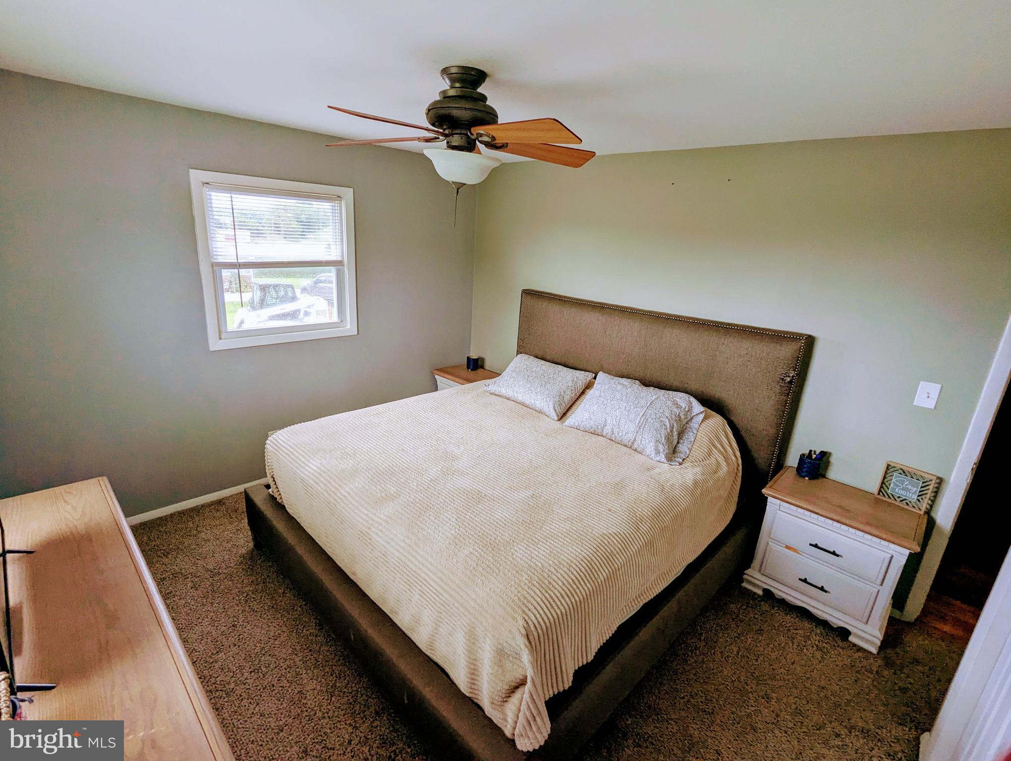 1719 Jefferson Road Spring Grove, PA 17362 - Photo 21 of 37 a bed sitting in a bedroom next to a window