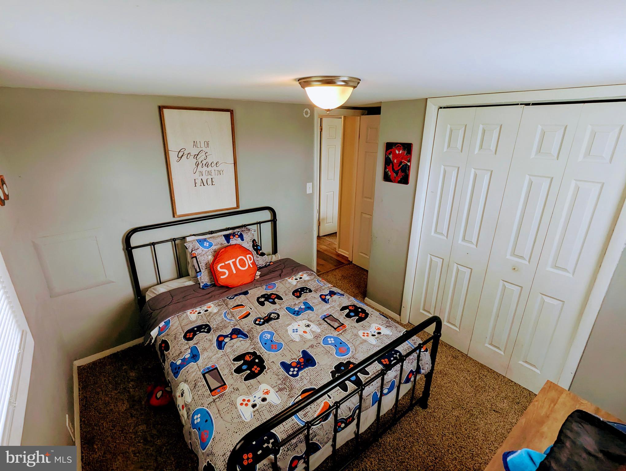 1719 Jefferson Road Spring Grove, PA 17362 - Photo 22 of 37 a bedroom with a bed and a window