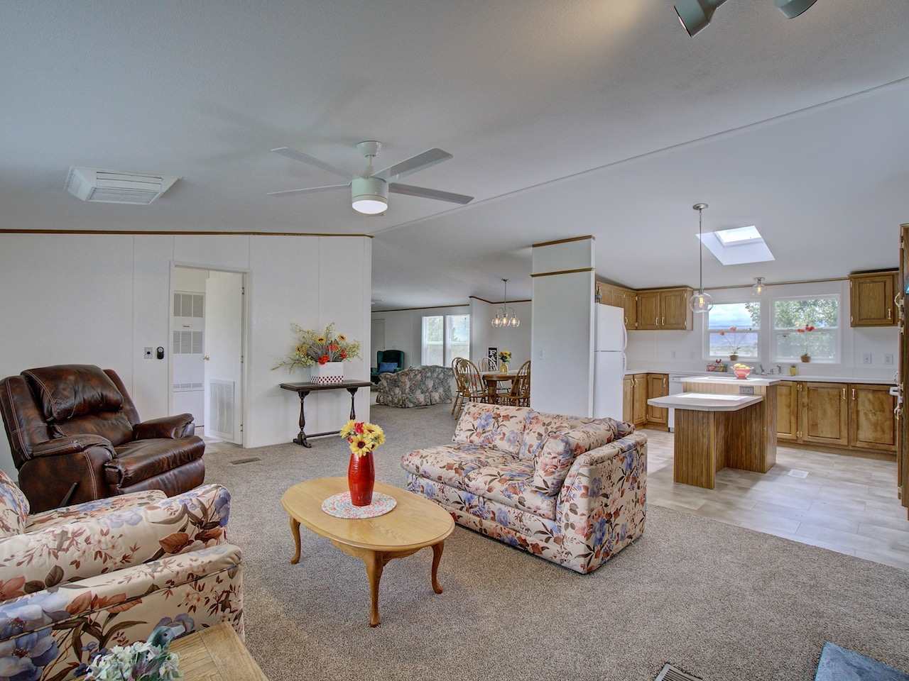 1317 Saddle Ridge Road Loma, CO 81524 - Photo 2 of 32 a living room with furniture and kitchen view