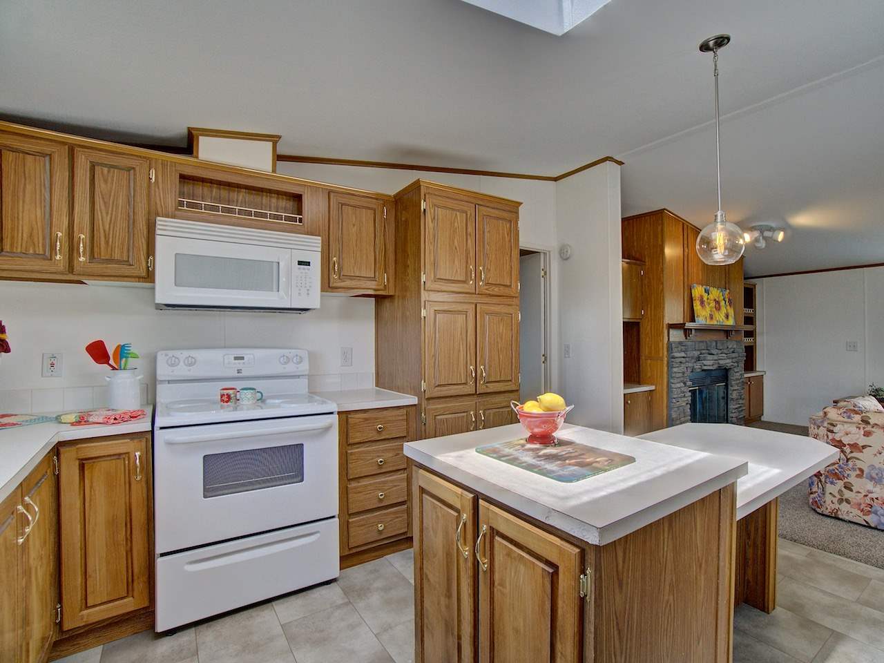 1317 Saddle Ridge Road Loma, CO 81524 - Photo 4 of 32 a kitchen with a sink a stove and cabinets