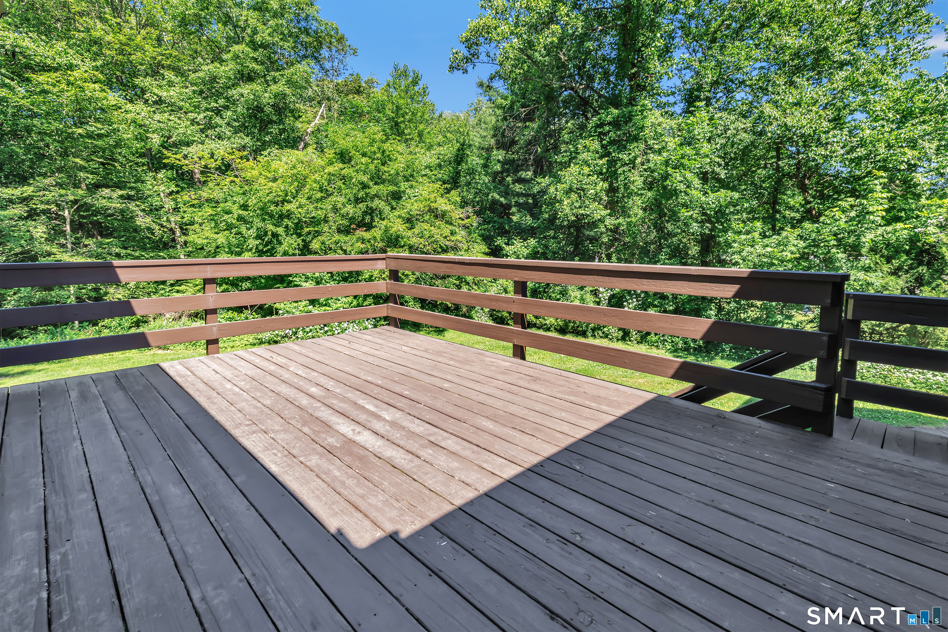 69 Forest Road Monroe, CT 06468 - Photo 38 of 39 a view of wooden deck with seating and trees