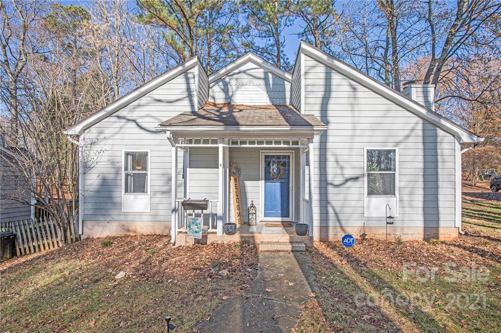 10227 Grand Junction Road Mint Hill, NC 28227 - Photo 2 of 27 a front view of a house with a yard